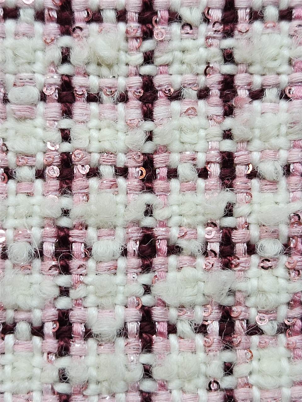 Detailaufnahme des rosa-weissen Schalgewebes